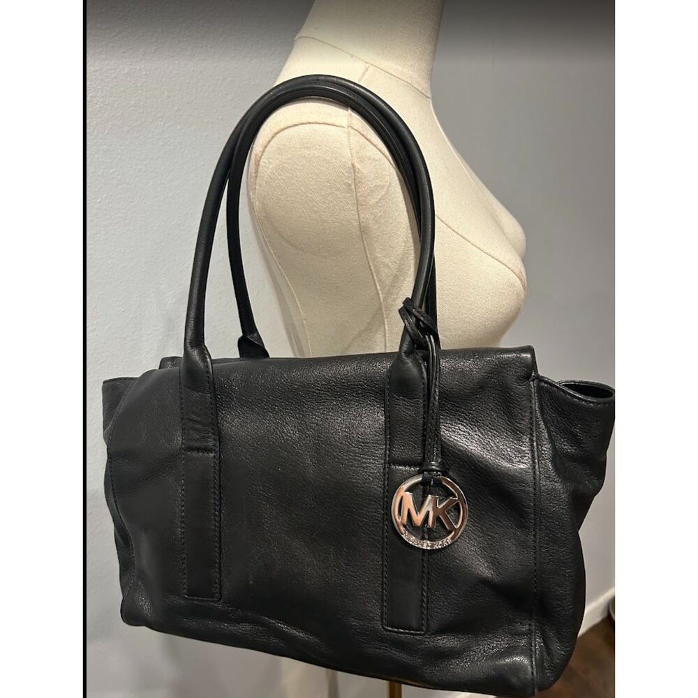 Michael Kors black leather shoulder tote bag.